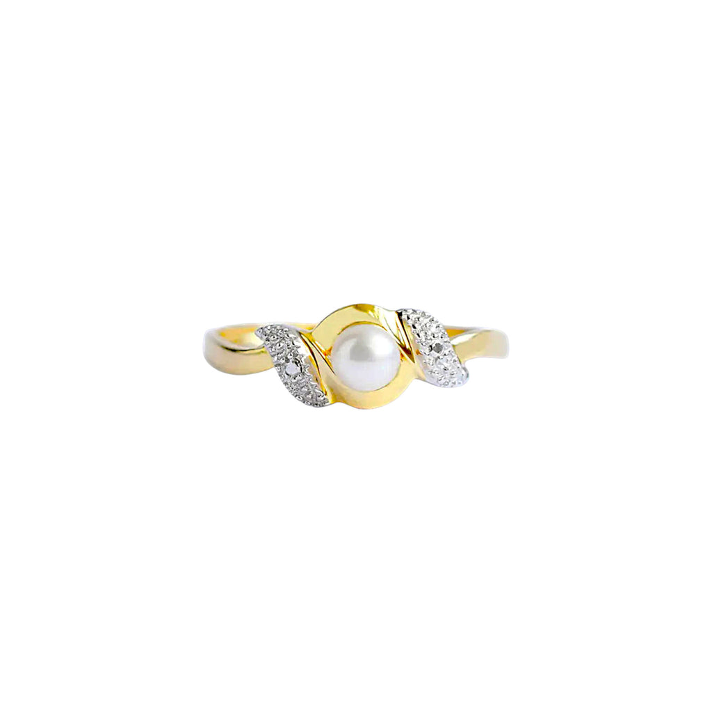 An elegant 18k gold bypass ring featuring a luminous central pearl, with sparkling textured details on each side.