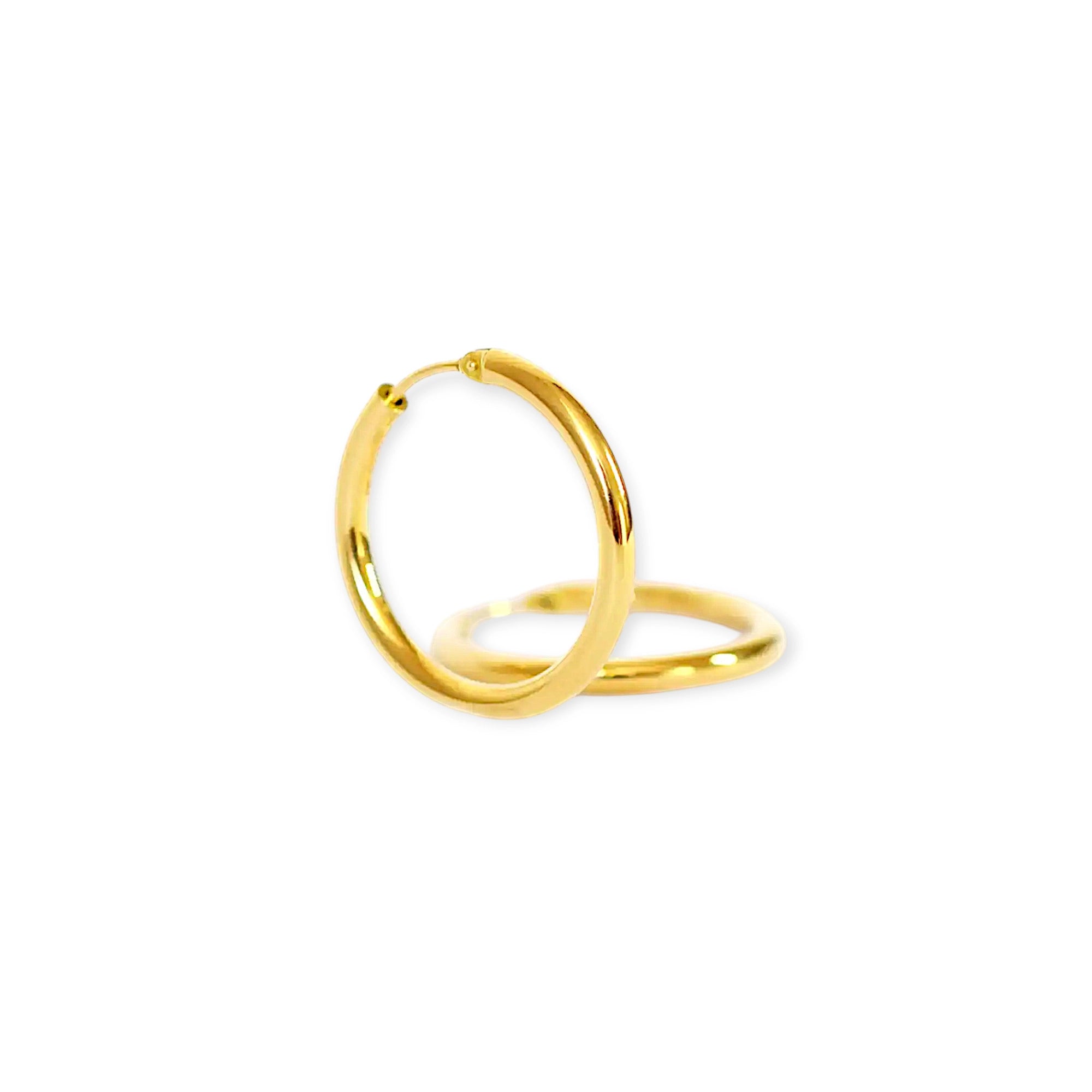 Classic 18 Karat Yellow Gold Hoop Earrings with a smooth, polished finish.