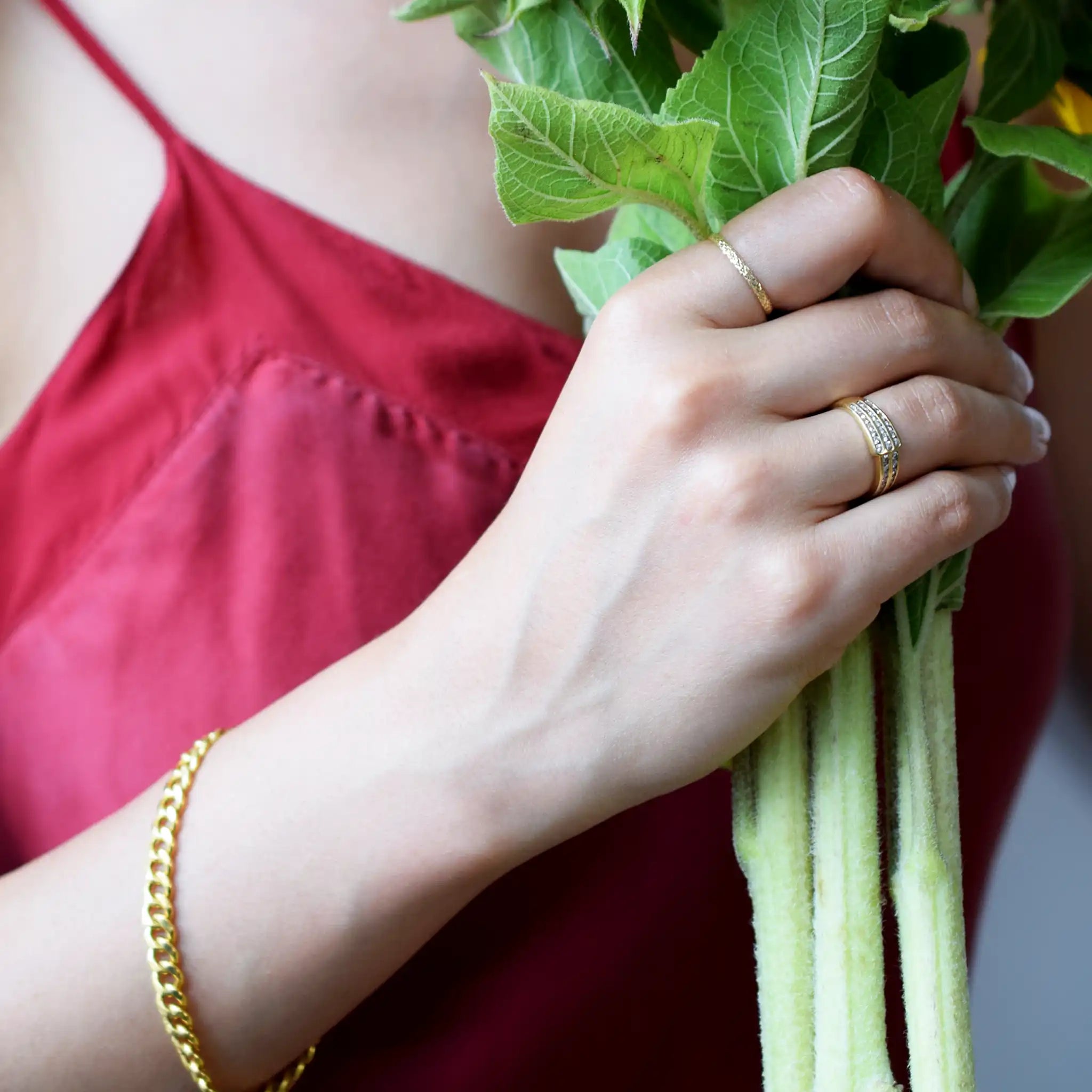 Elegant 18 Karat Yellow Gold band ring featuring multiple rows of brilliant-cut diamonds in a fine pavé setting.