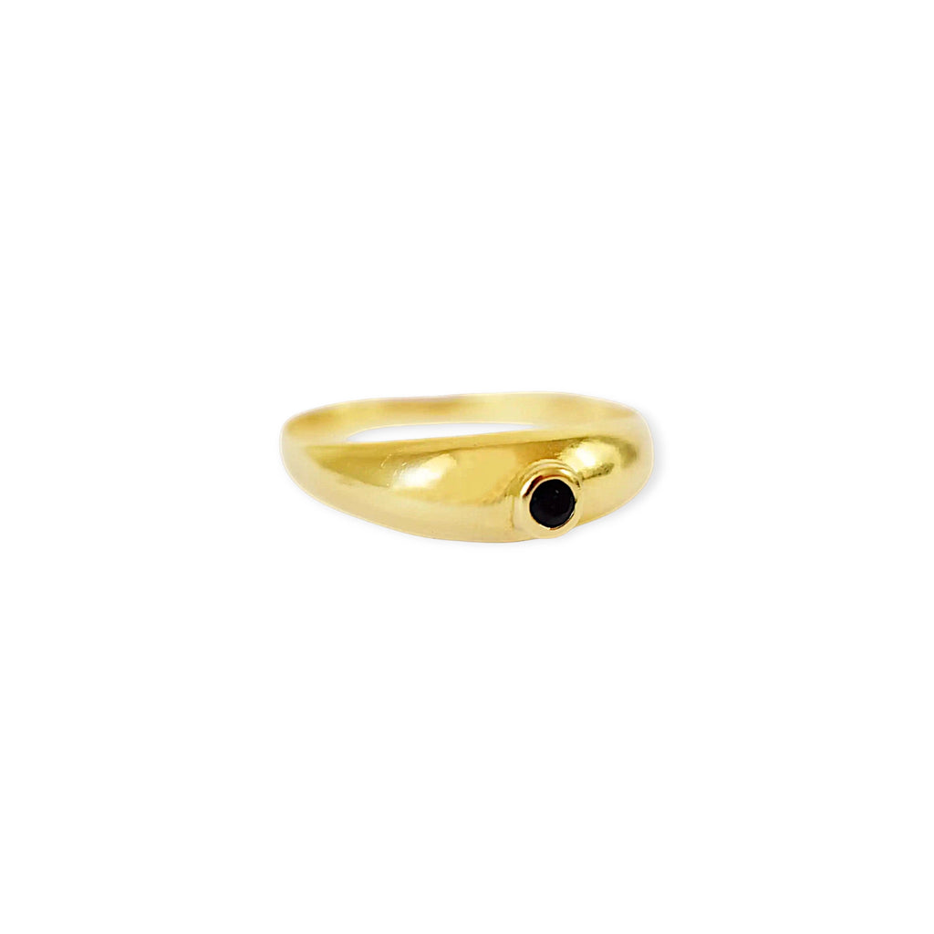 Elegant 18 Karat Yellow Gold vintage cigar band ring featuring a prominent round bezel-set blue sapphire.