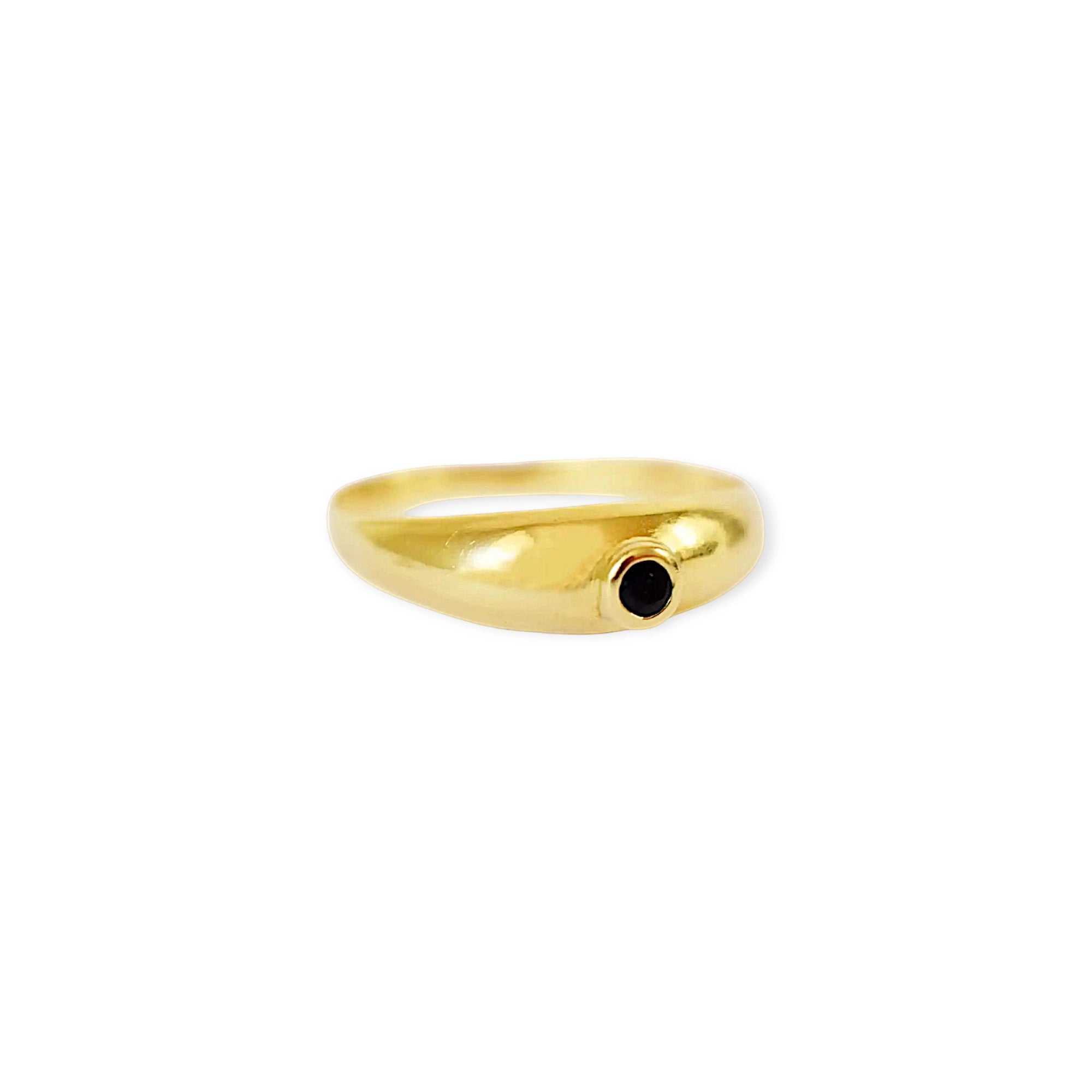 Elegant 18 Karat Yellow Gold vintage cigar band ring featuring a prominent round bezel-set blue sapphire.