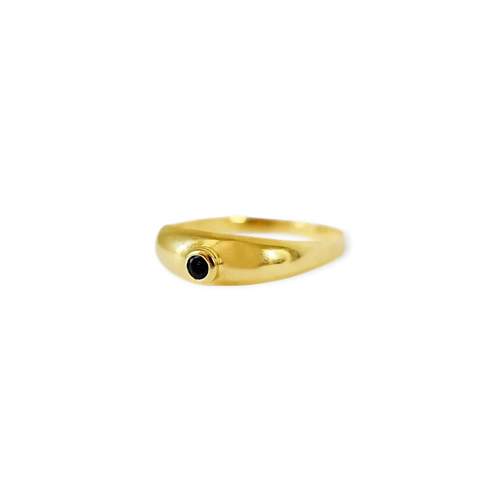 Elegant 18 Karat Yellow Gold vintage cigar band ring featuring a prominent round bezel-set blue sapphire.