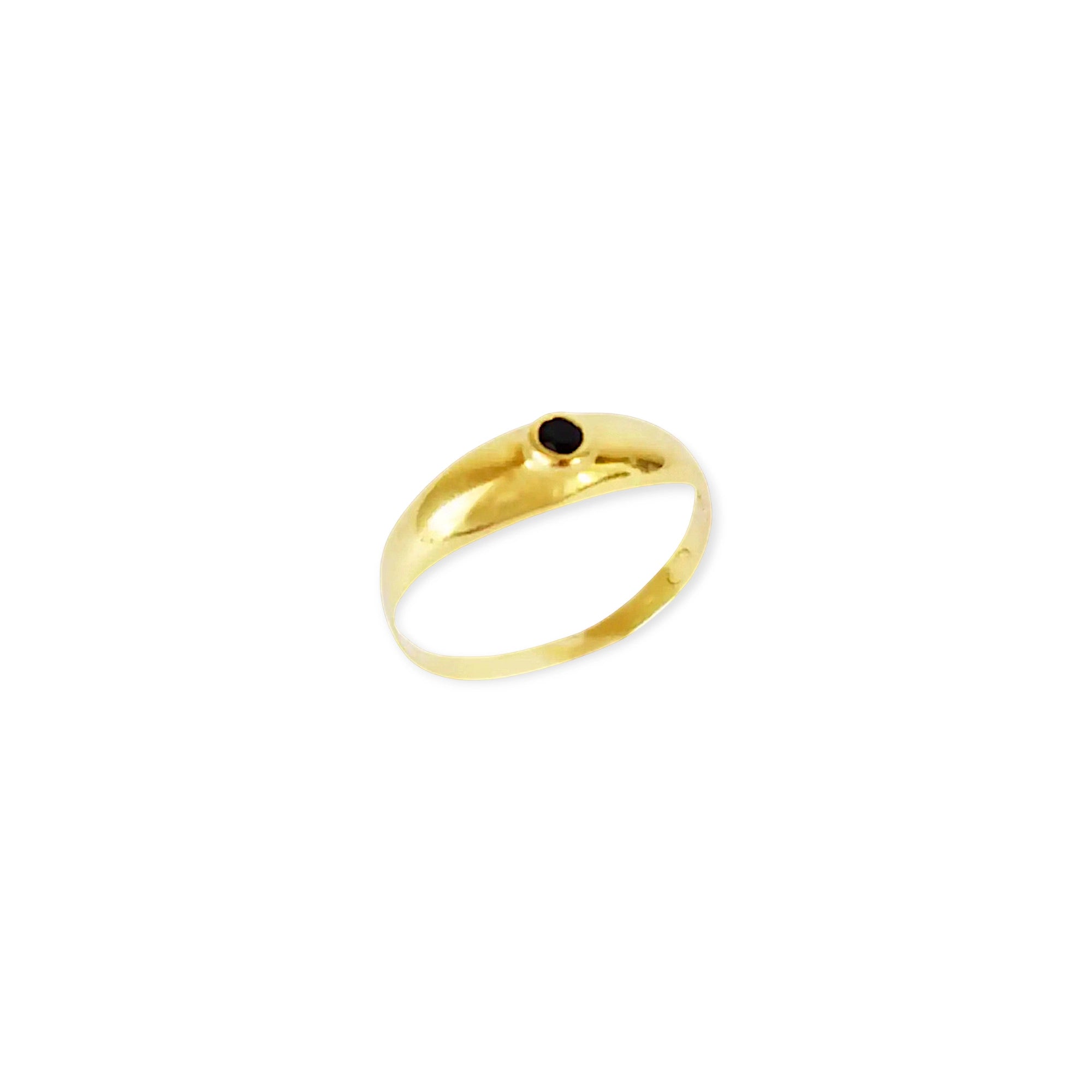 Elegant 18 Karat Yellow Gold vintage cigar band ring featuring a prominent round bezel-set blue sapphire.