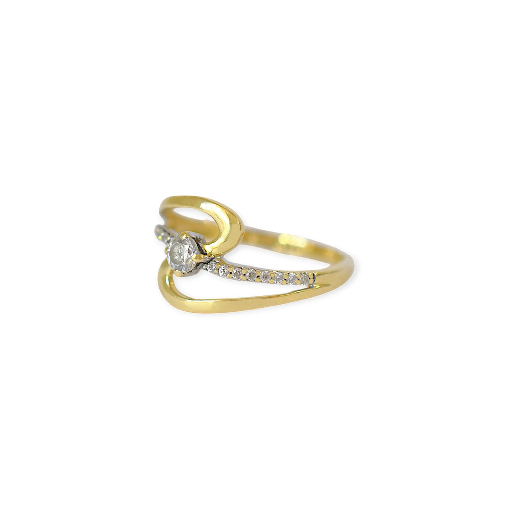 Elegant 18 Karat Yellow Gold Ring with a swirling design, featuring a Marquise Cubic Zirconia as the center stone and side accents of small zirconia stones.