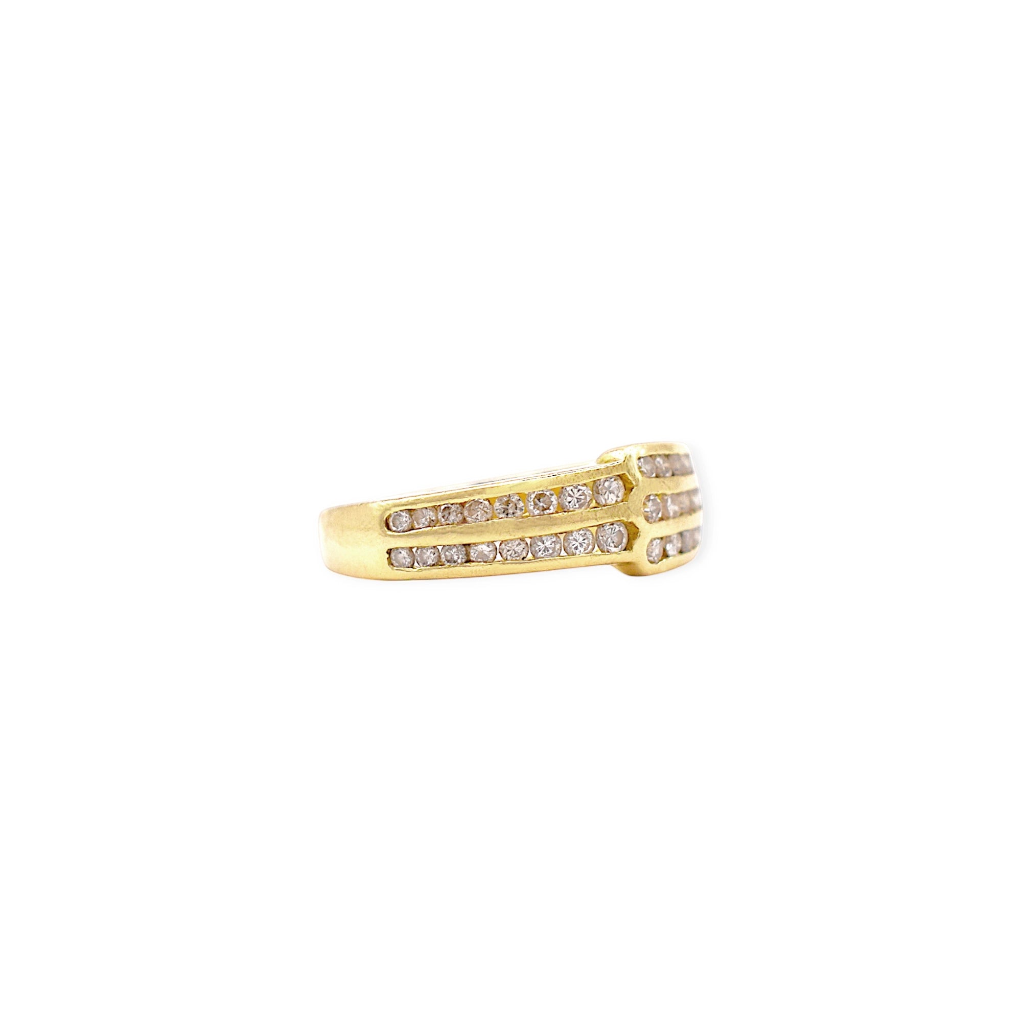 Elegant 18 Karat Yellow Gold band ring featuring multiple rows of brilliant-cut diamonds in a fine pavé setting.