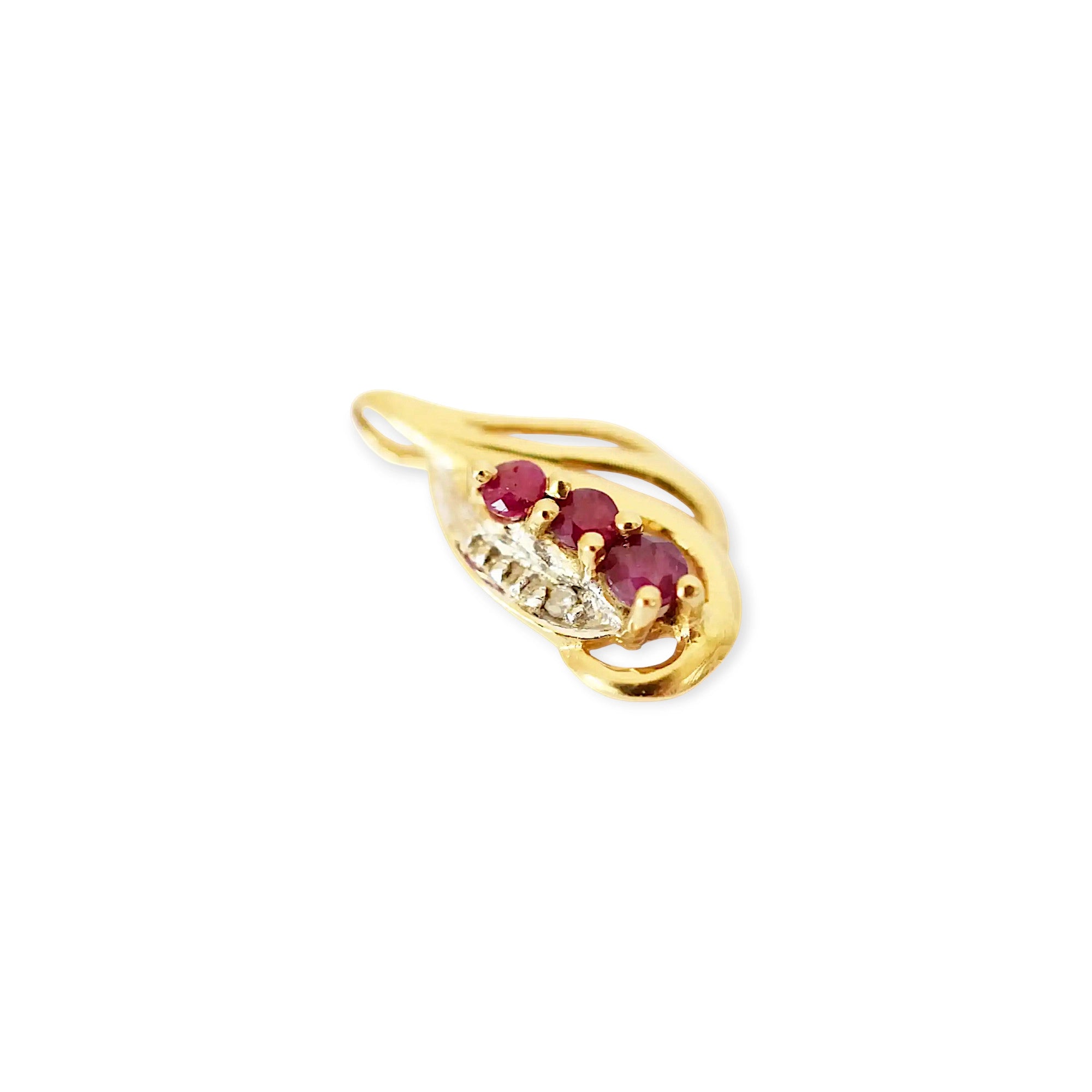 Elegant 18 Karat Yellow Gold vintage-style pendant with a sculpted, flowing design, featuring three vibrant rubies and a sparkling diamond accent.