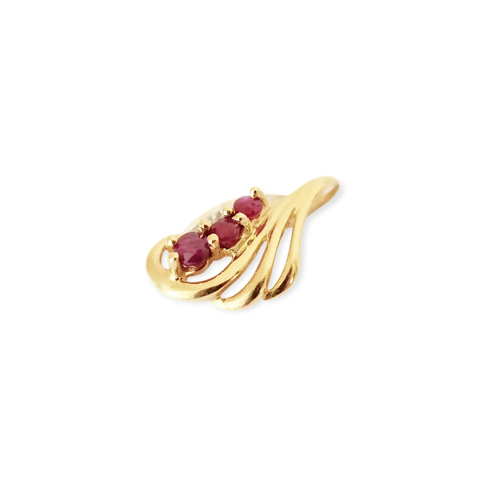 Elegant 18 Karat Yellow Gold vintage-style pendant with a sculpted, flowing design, featuring three vibrant rubies and a sparkling diamond accent.