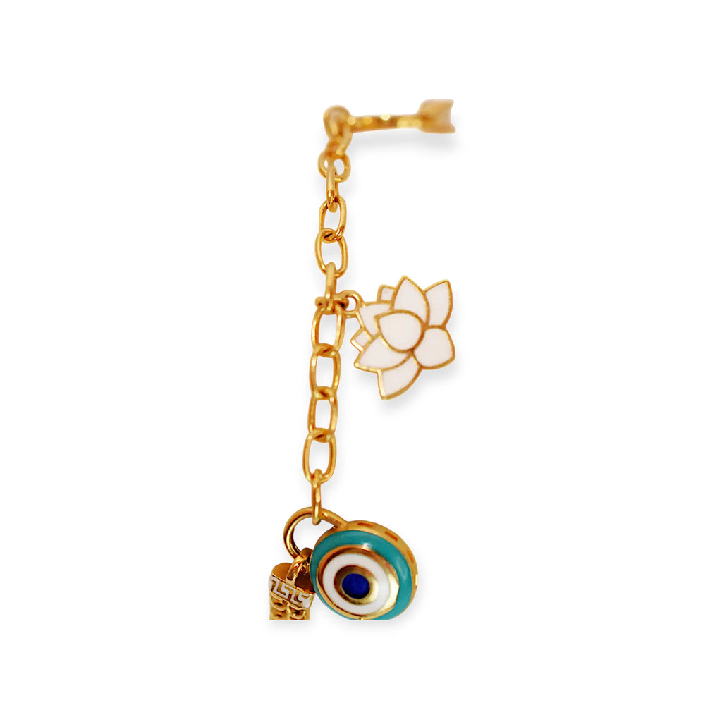 Elegant 21 Karat Yellow Gold double-chain charm bracelet, adorned with four diverse symbolic charms including a white lotus flower, a blue evil eye, and a miniature solitaire ring.