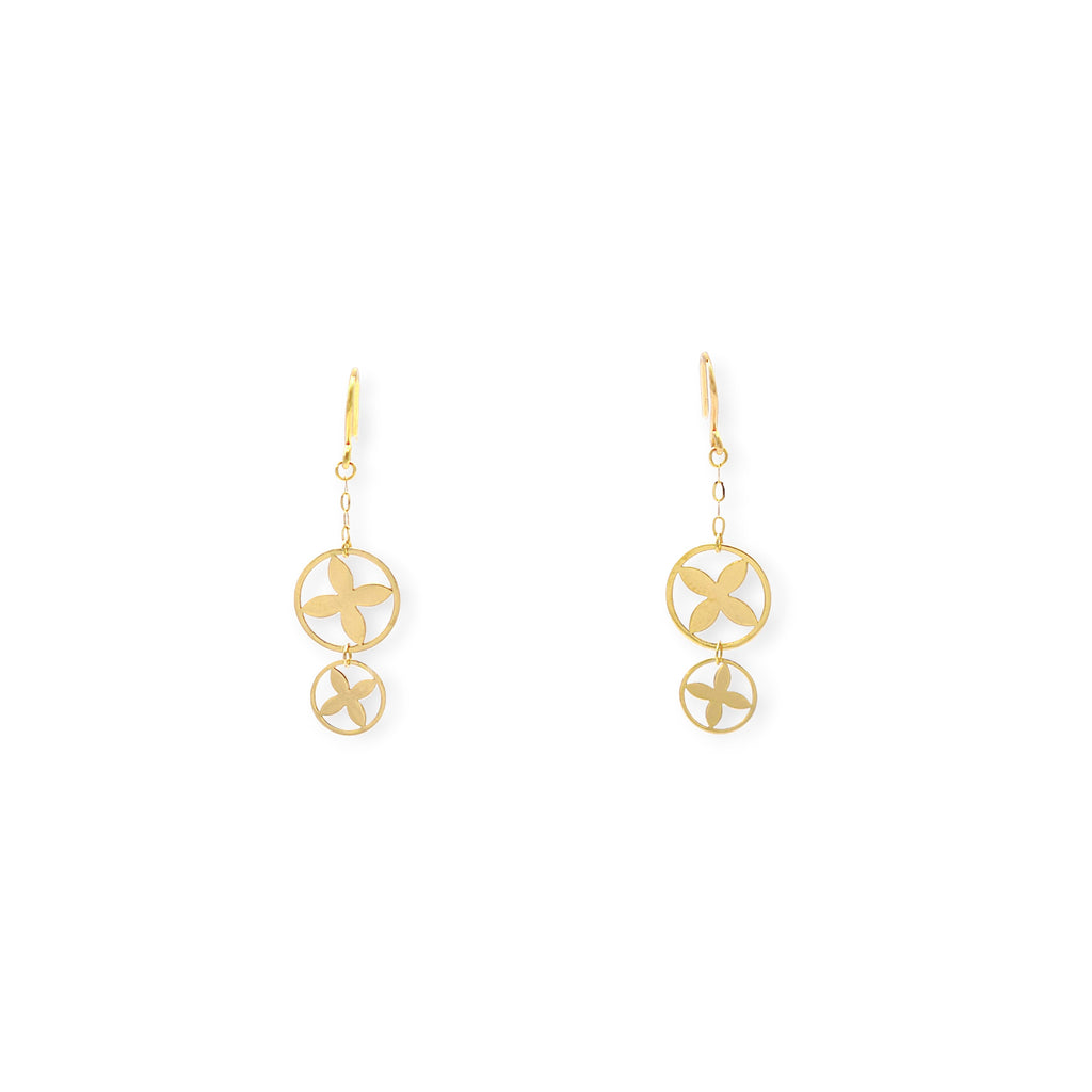 Modern 18K Yellow Gold drop earrings with a stacked double circle design and striking clover cut-out motif.