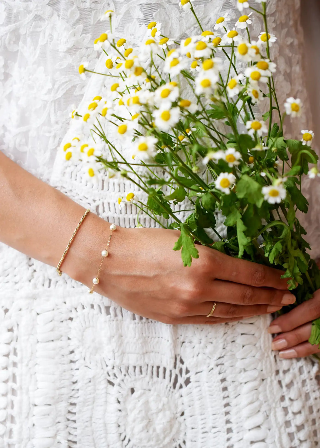 Romantic 18 Karat Yellow Gold bracelet showcasing glowing freshwater pearls along a delicate link chain.