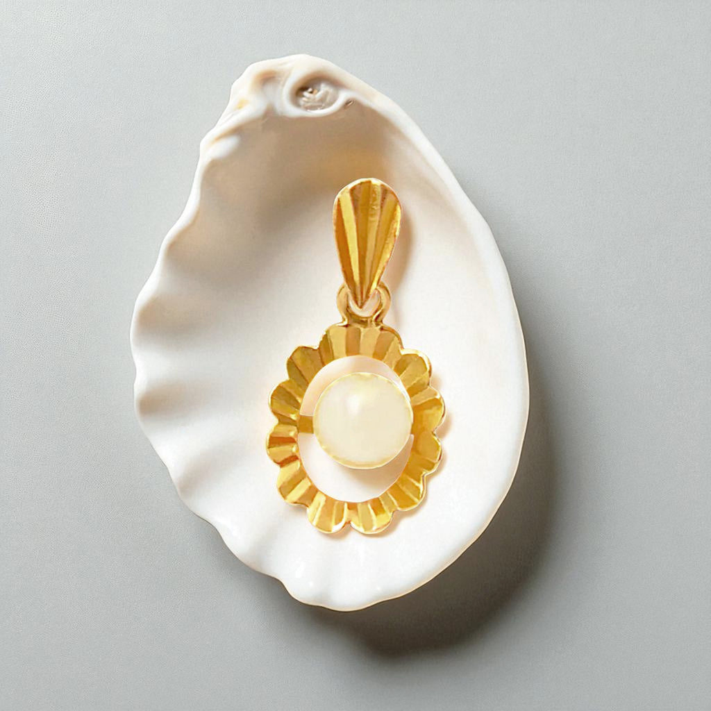 18 Karat Gold pendant with a Pearl on a white shell against a light gray background